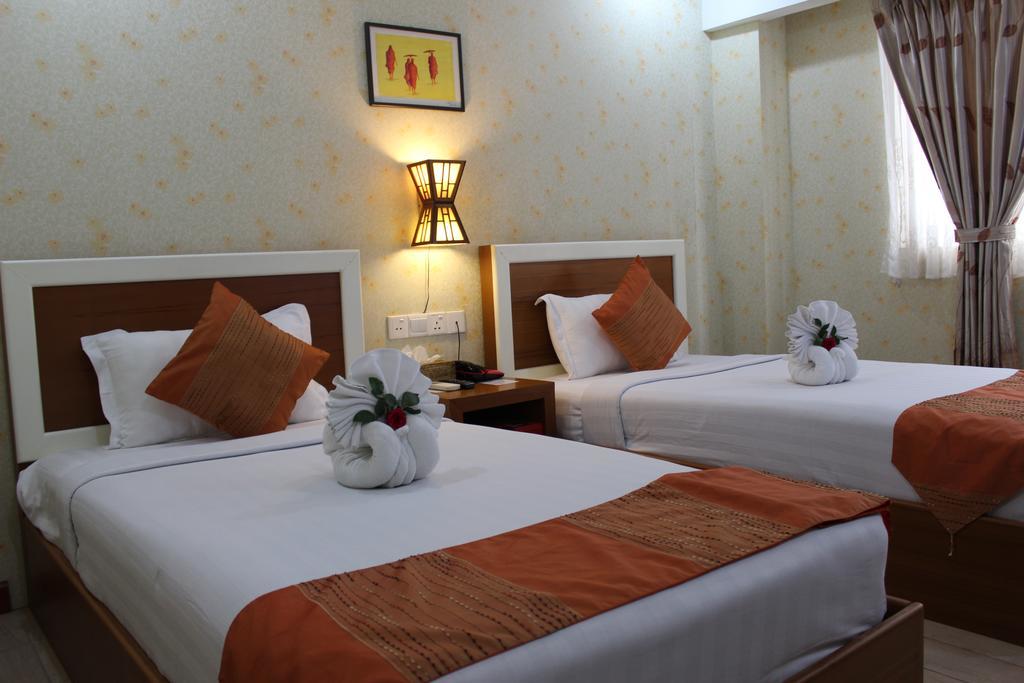 Hotel Kan Kaw Yangón Habitación foto