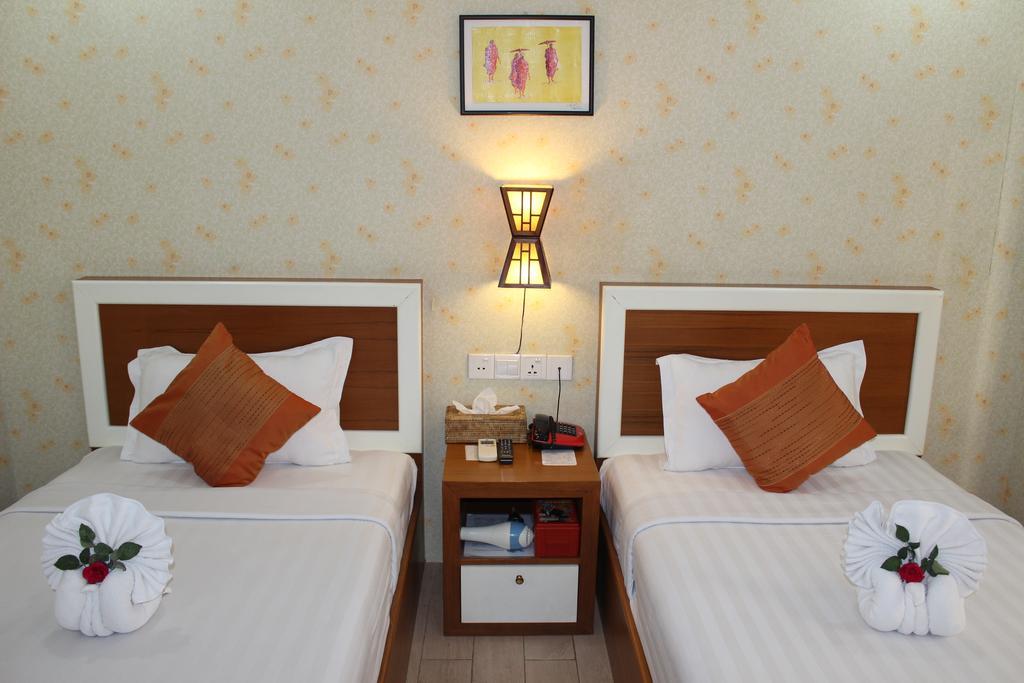 Hotel Kan Kaw Yangón Habitación foto