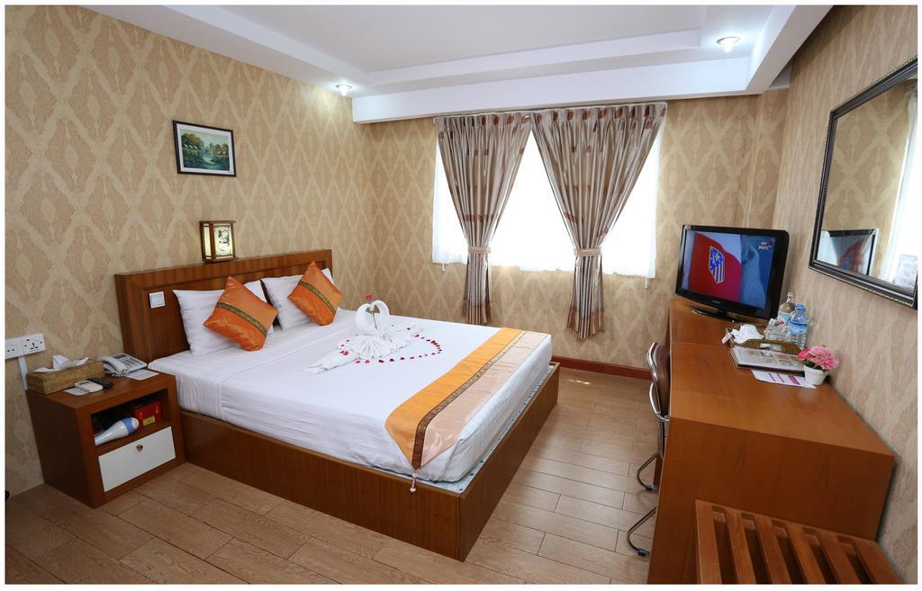 Hotel Kan Kaw Yangón Habitación foto