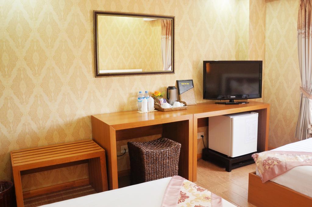 Hotel Kan Kaw Yangón Habitación foto