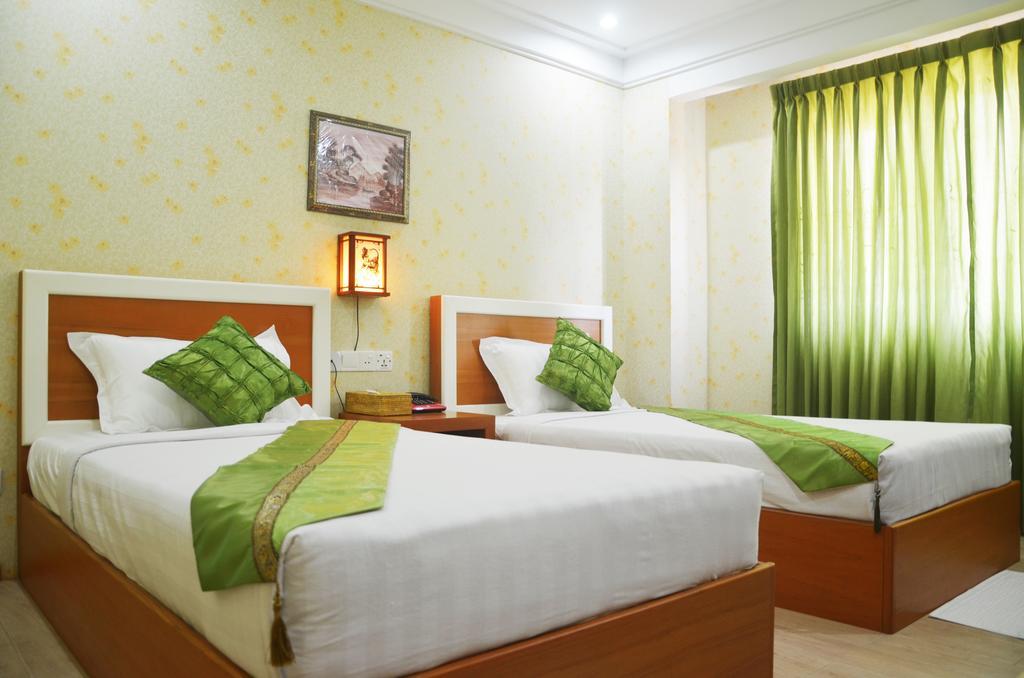 Hotel Kan Kaw Yangón Habitación foto