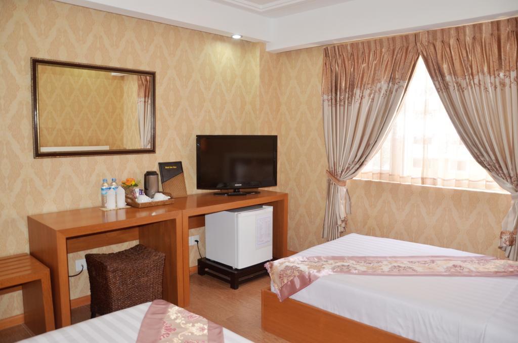 Hotel Kan Kaw Yangón Habitación foto